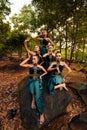 A Group of Balinese people wearing traditional green costume before the dance festival begin