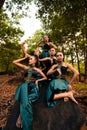 A Group of Balinese people wearing traditional green costume before the dance festival begin