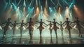 A group of ballet dancers performing on stage under Royalty Free Stock Photo