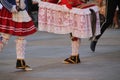 Group of Basque folk dancers performing in a vibrant outdoor festival