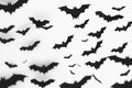 A group of bats flying through the air at night Royalty Free Stock Photo