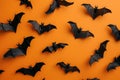 A group of bats flying in the air, suitable for Halloween themes Royalty Free Stock Photo