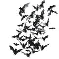 A Group of Bats Flying in the Dark Royalty Free Stock Photo