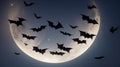 A group of bats silhouetted against the backdrop of a crescent moon