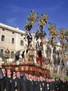 A group of bearers (called Costaleros) carrying a religious float