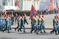 Group Bearers with swords in blue uniforms.