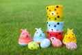 Group of bears, rabbit Eggs pastel in the grass Royalty Free Stock Photo