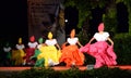 Colombian folklore dancers waving skirt dancing at night outdoor stage