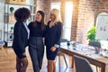 Group of beautiful businesswomen smiling happy and confident Royalty Free Stock Photo