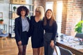 Group of beautiful businesswomen smiling happy and confident Royalty Free Stock Photo