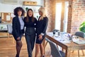 Group of beautiful businesswomen smiling happy and confident Royalty Free Stock Photo