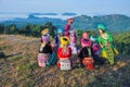 Group beautiful girls with their colorful dresses playimg traditional game