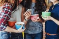 Group beautiful young people enjoying in conversation and drinking coffee, best friends girls together having fun