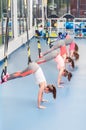 Group of beautiful young women working out on TRX Royalty Free Stock Photo