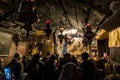 A group of believers holds a joint prayer in the Christmas Cave in the Church of Nativity in Bethlehem in Palestine Royalty Free Stock Photo