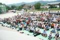 The large group of Muslim's sitting outside of Mosque