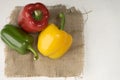 group of bell peppers with burlap cloth