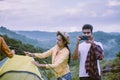 Group of best friends Traveller putting up a tent in nature,Enjoying camping concept Royalty Free Stock Photo