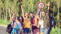 Group of multiracial best friends having fun during travel adventure in countryside