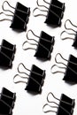 Group of binder clips over white background Royalty Free Stock Photo