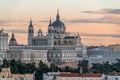 Group of birds flying over Madrid skyline at Sunset. Almudena cathedral and Royal Palace. Spain. Royalty Free Stock Photo