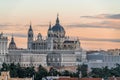 Group of birds flying over Madrid skyline at Sunset. Cathedral and Royal Palace. Spain. Royalty Free Stock Photo