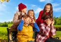 Group of birls surprising boys Royalty Free Stock Photo