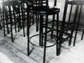 Group of black barstools close up Royalty Free Stock Photo