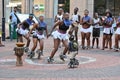 Group of black boys and girls in local costume performing a typical african dance in the city centre of Cape Town, South Africa Royalty Free Stock Photo