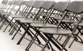 A group of black folding chairs