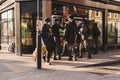 Group of black teenagers hanging out next to the shop