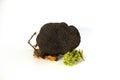 Group of Black Truffles Still Life on white background and leafs Royalty Free Stock Photo