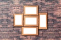 Group of blank wood picture frame on the old brick wall with cop Royalty Free Stock Photo