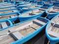 Group of blue rowboat at river Royalty Free Stock Photo