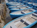 Group of blue rowboat at river Royalty Free Stock Photo