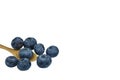 group of blueberry fresh fruit on wooden bowl spoon . Isolated on white background with clipping path Royalty Free Stock Photo