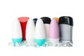 Group of body deodorants and ice isolated on background