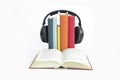 Group of books and headphones related to audiobooks with isolate Royalty Free Stock Photo