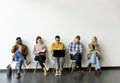 Group of bored people waiting for the job interview Royalty Free Stock Photo