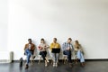 Group of bored people waiting for the job interview Royalty Free Stock Photo