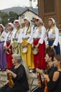 Group of bosnian musician in front of sebilj fountain, traditionally dressed