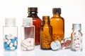 Group of bottles of medicine with pills. Royalty Free Stock Photo