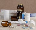 A group of boxes of medicines, pill bottles, thermometer and blisters of pills Royalty Free Stock Photo