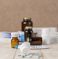 A group of boxes of medicines, pill bottles, thermometer and blisters of pills Royalty Free Stock Photo