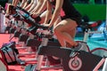 Group of Boys and Girls at Gym: Workout with Spinning Bikes Royalty Free Stock Photo