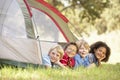 Group Of Boys Having Fun In Tent In Countryside Royalty Free Stock Photo