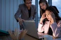 Group of broker international stock traders working actively at night in office, Royalty Free Stock Photo