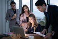 Group of broker international stock traders working actively at night in office, Royalty Free Stock Photo