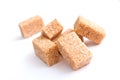 Group of brown cane sugar cubes Royalty Free Stock Photo