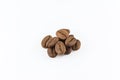 Group of brown color coffee beans isolated white background Royalty Free Stock Photo